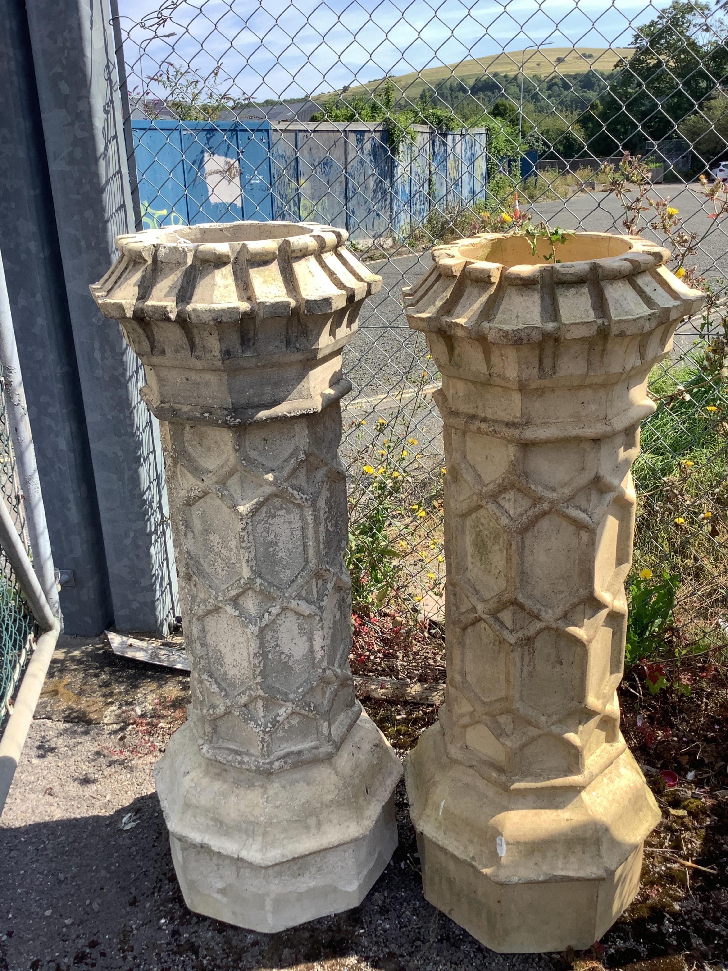 A pair of earthenware chimney pots, height 124cm. Condition - fair